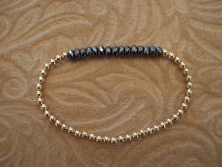 # 2204 3 mm Gold Filled with Hematite Top