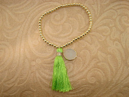 Model # 6406 3 mm Gold Filled with Moon Stone Drop and Lime Green Silk Tassel
