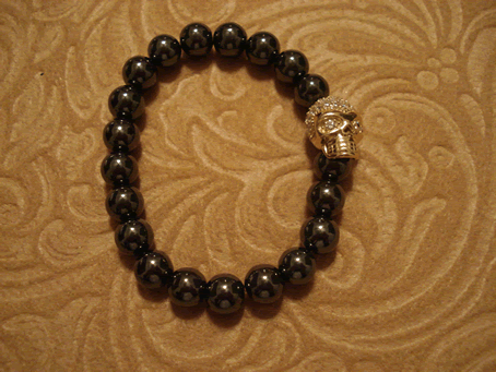 # 9019 Gold Cubic Zirconia Skull on 8 mm Hematite Beads