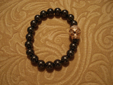 # 9030 Rose Gold Cubic Zirconia Skull on 8 mm Hematite Beads